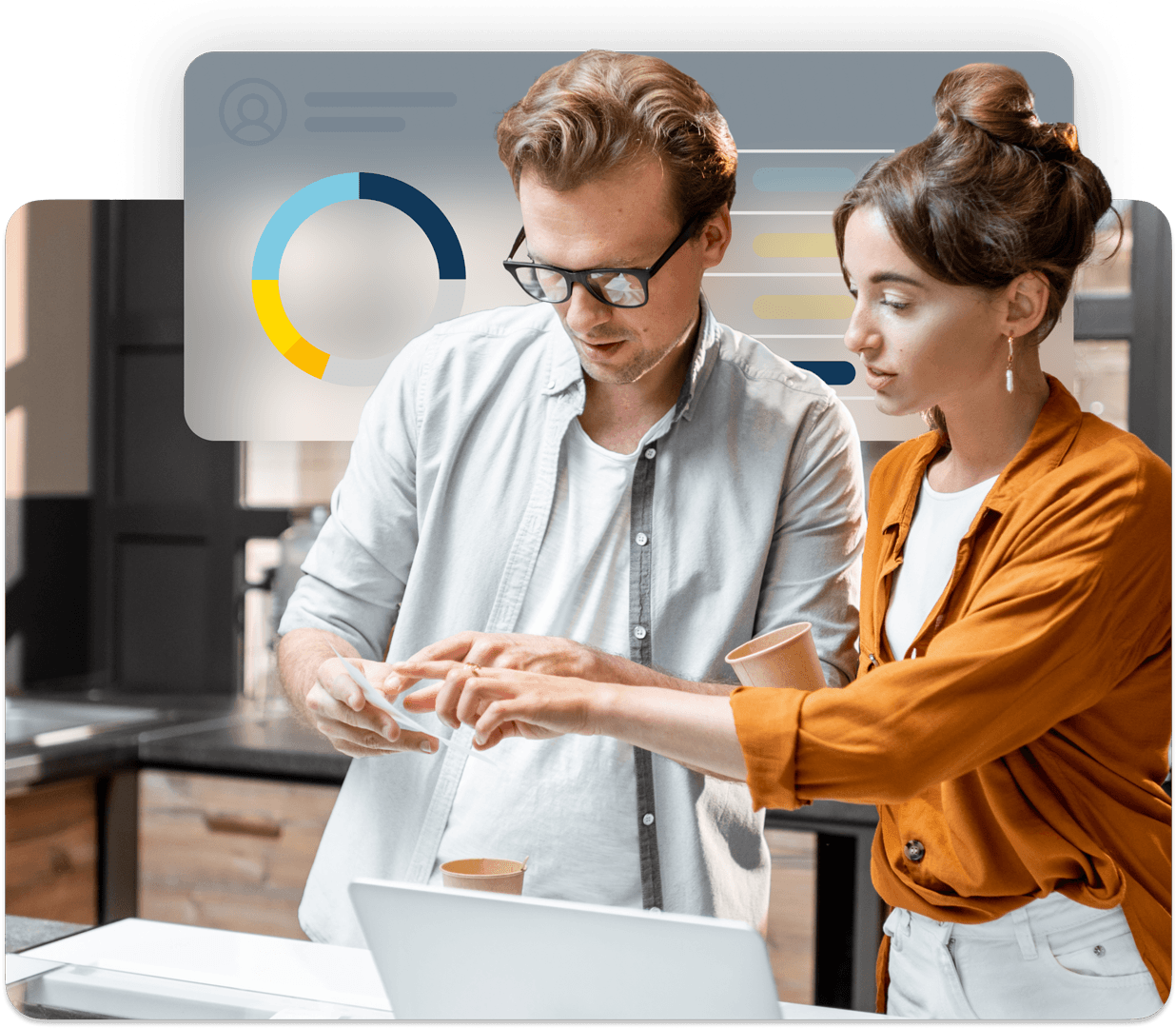 Two coworkers reviewing data